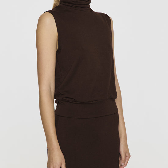 Coco | The Sleeveless Turtleneck Angle