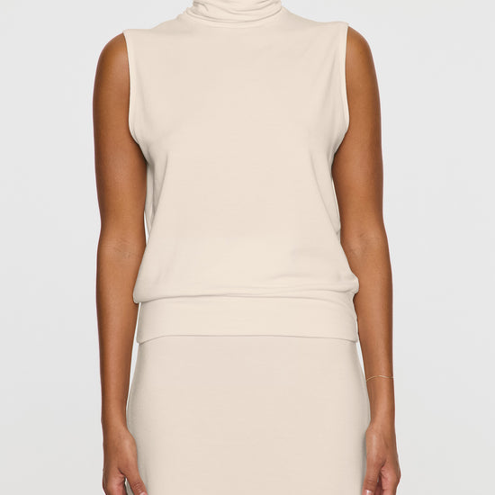 Stone | The Sleeveless Turtleneck Front