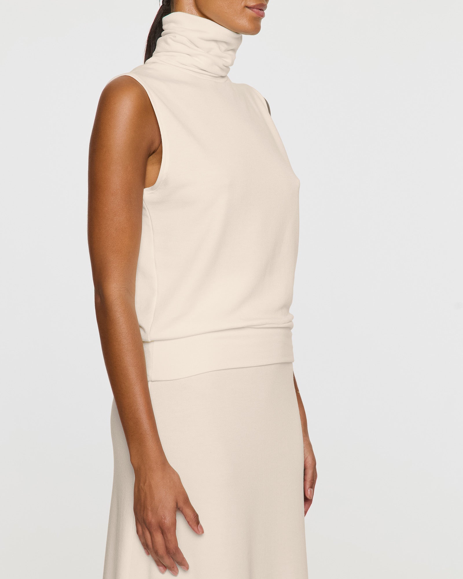 Stone | The Sleeveless Turtleneck Angle