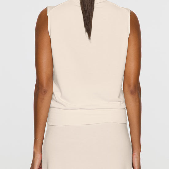 Stone | The Sleeveless Turtleneck Back
