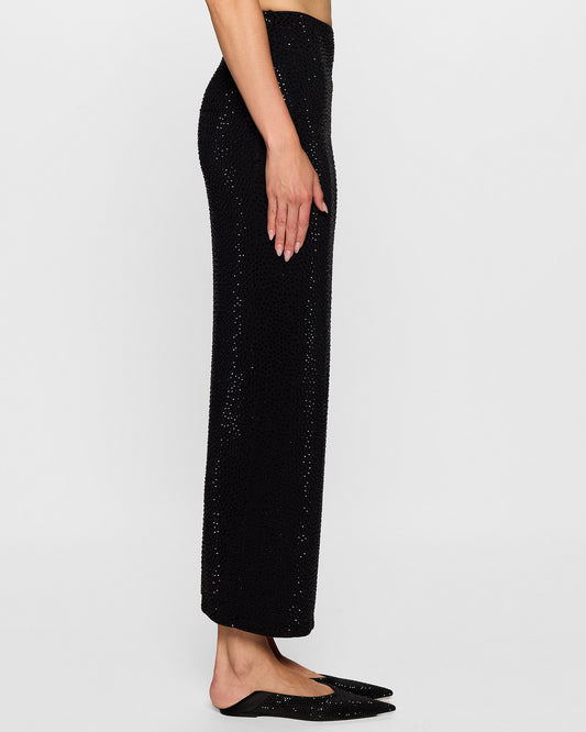 Black sequined skirt and shoes.
